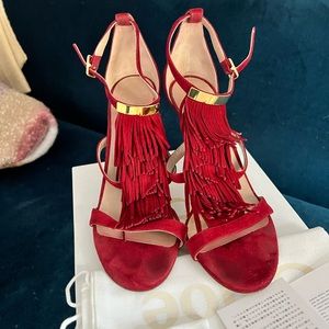 Chloe - Stunning and festive red suede heels with fringe and gold detail.